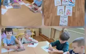 Dzieci kończą kolorować swoją pracę i podziwiają efekty.